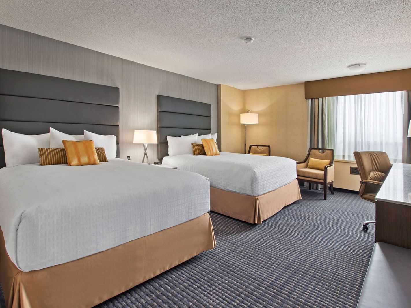 two beds in modern hotel room
