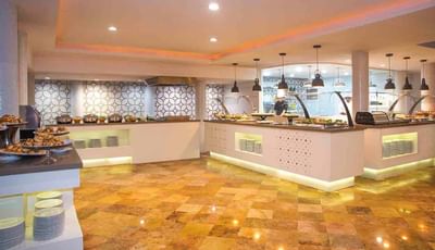 Chef working in the kitchen area at Buenaventura Grand Hotel
