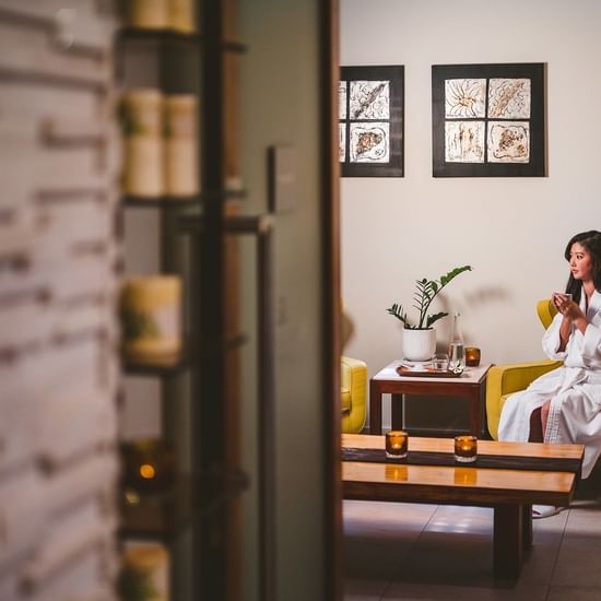 Lady drinking herbal drink at Pullman Palm Cove Resort & Spa 