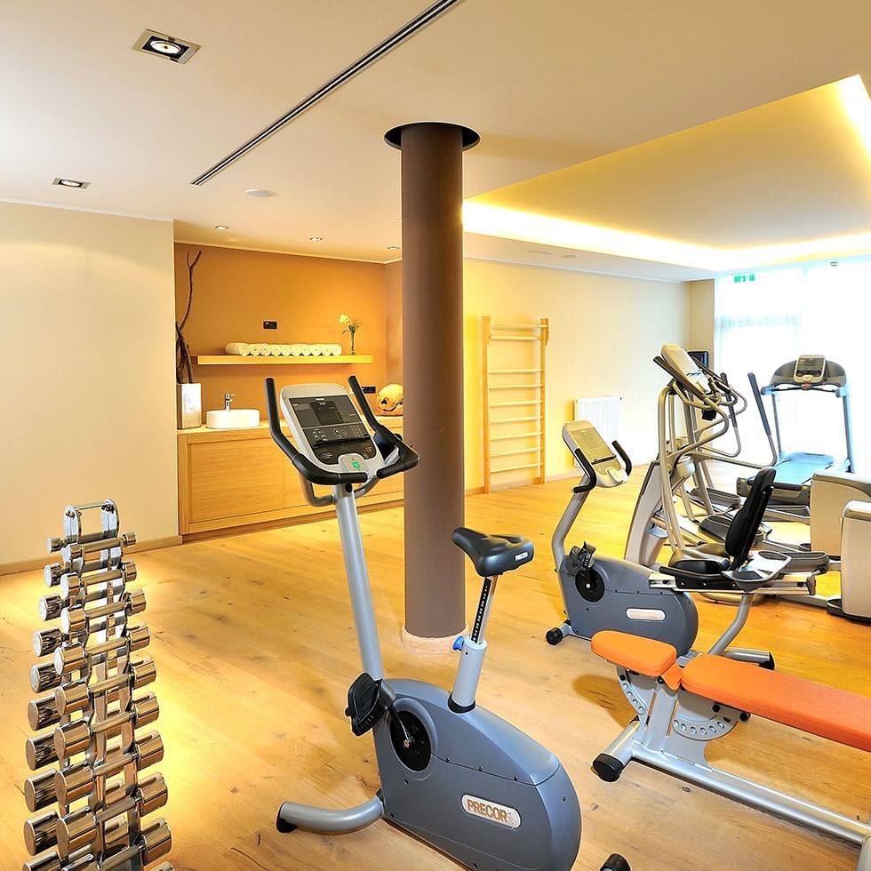 Fitness equipment in the gym at Falkensteiner Hotels