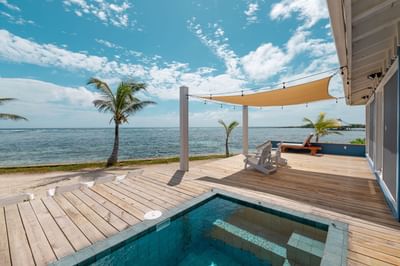 Plunge pool and wooden deck with sea view in Grand Villa at Roatan, Honduras, accommodations Barefoot Cay Resort & Marina 