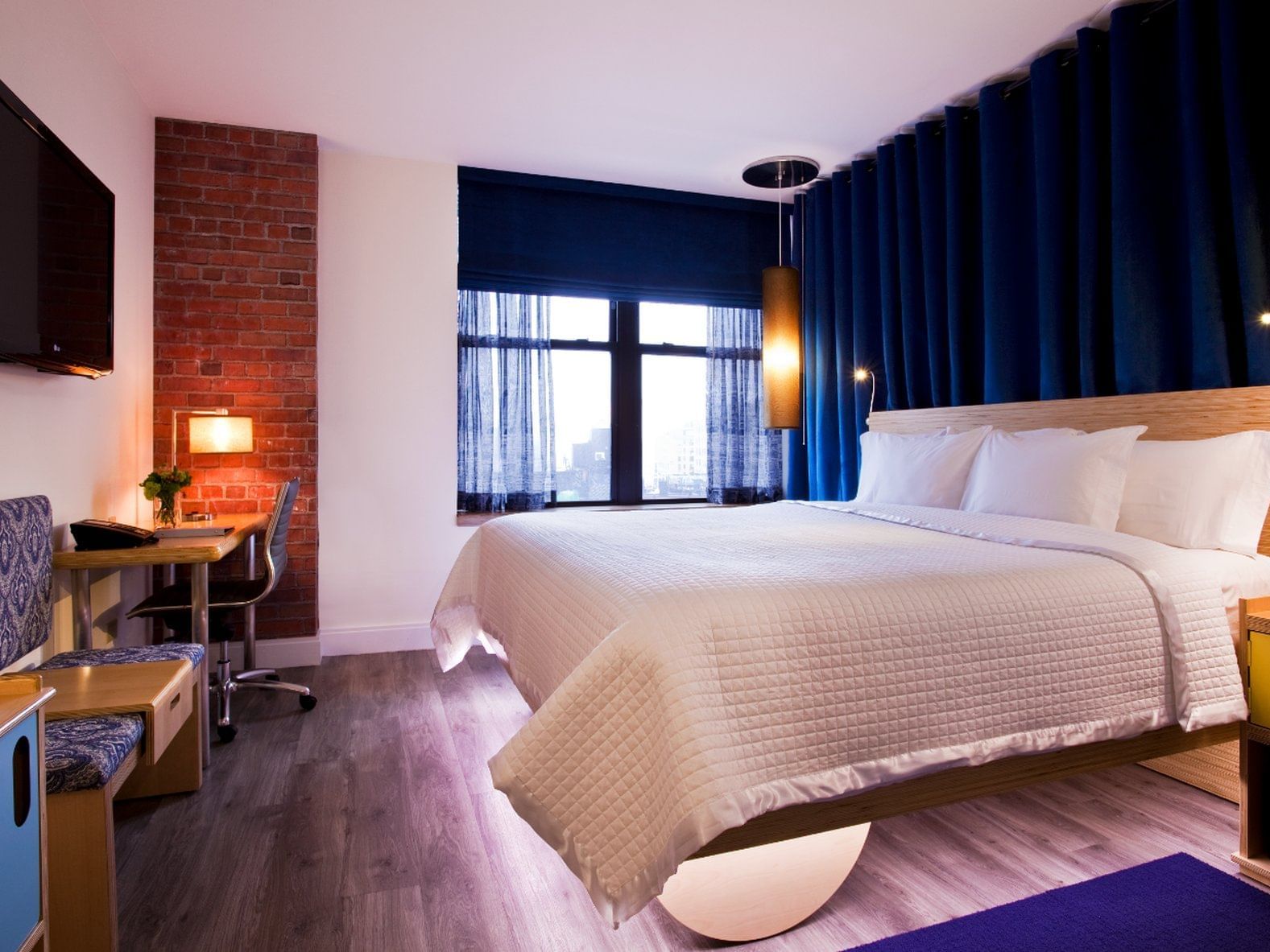 a bed in a hotel room