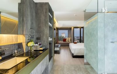 Room with walk-in shower and toiletries at U Hotels