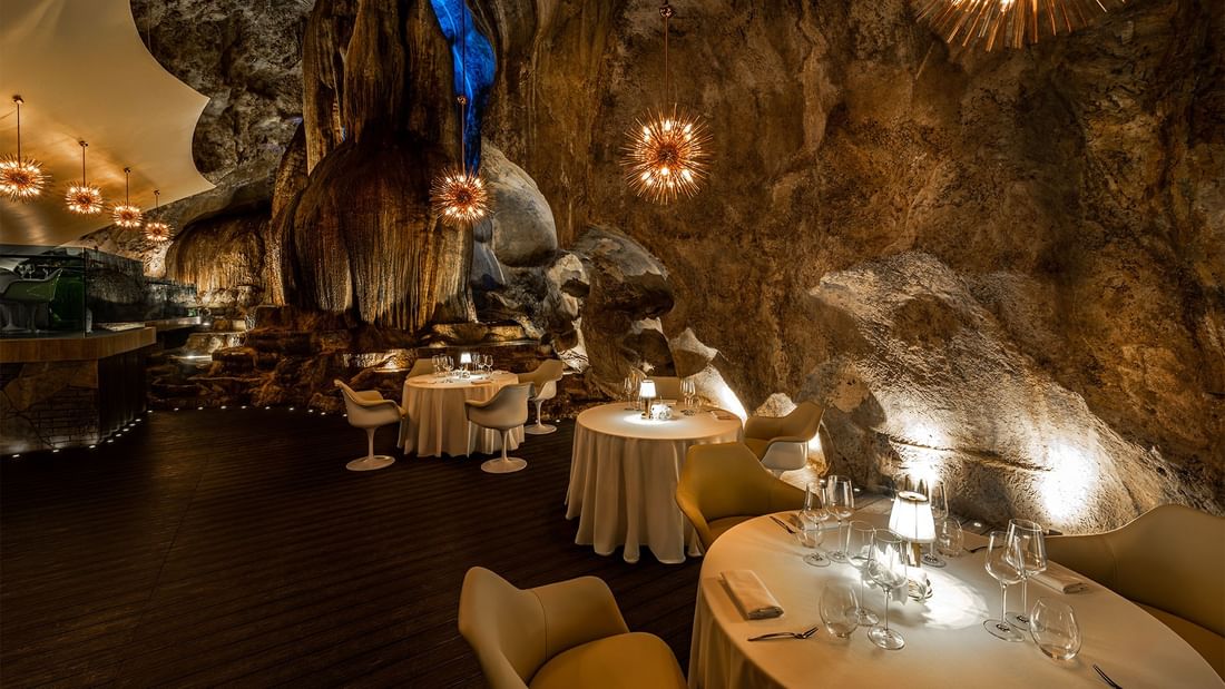 3 tables in jeff's cellar fine dining cave restaurant