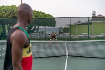 Two players playing tennis at Holiday Inn Montego Bay