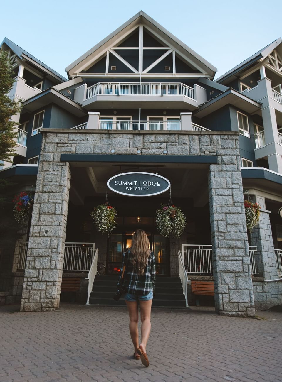 A girl at the Entrance of Summit Lodge Boutique Hotel