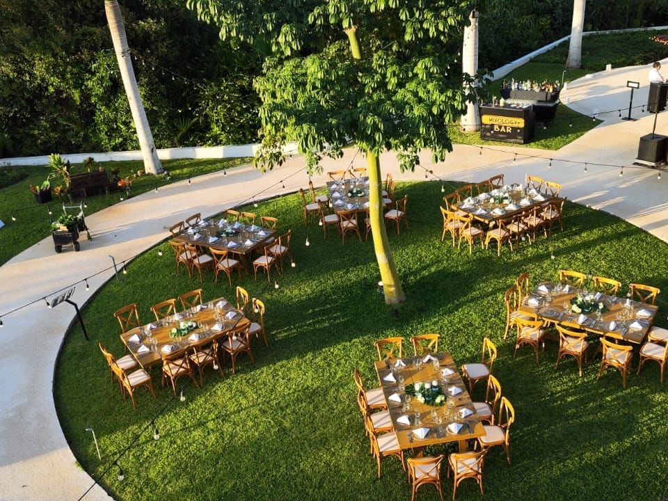 Outdoor banquet-style dining set-up in Ceiba Garden at Haven Riviera Cancun