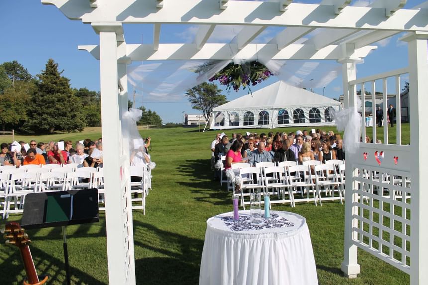 Guests seated for a wedding ceremony at Evergreen Resort