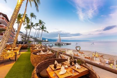 An open air dining & lounge area at Playa Los Arcos
