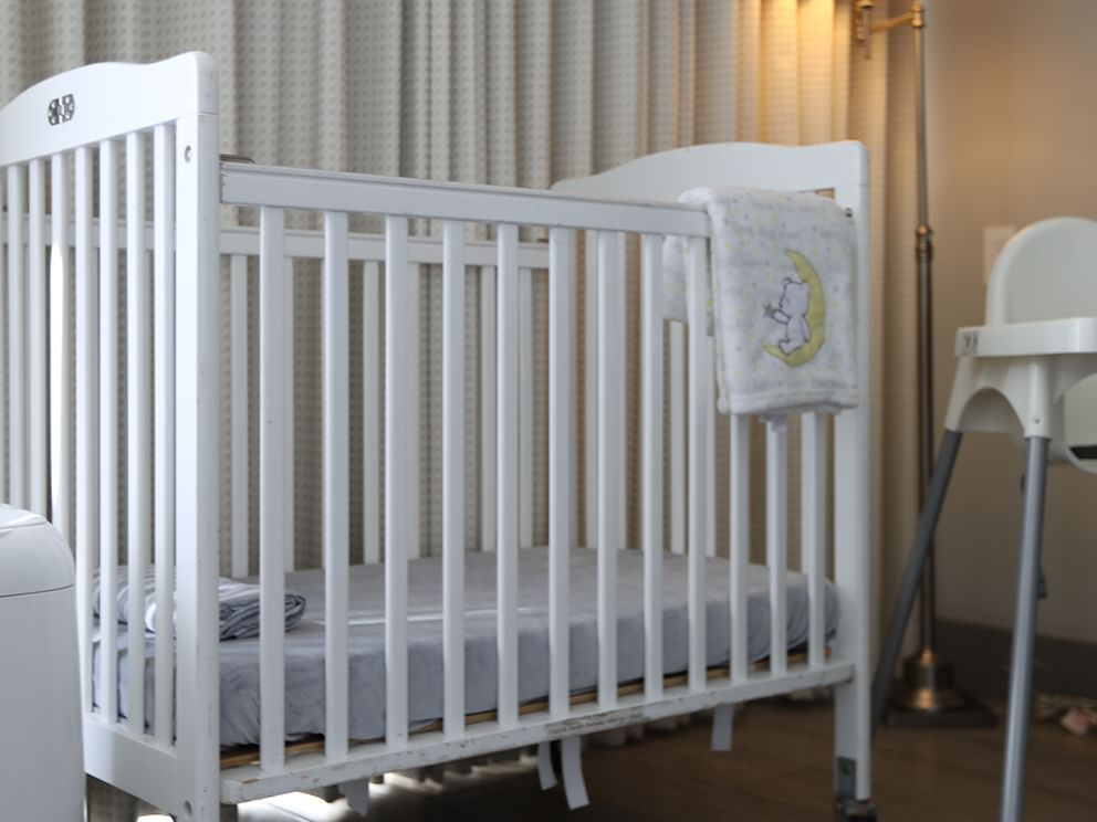 Close-up of a white crib in a room at South Beach Hotel