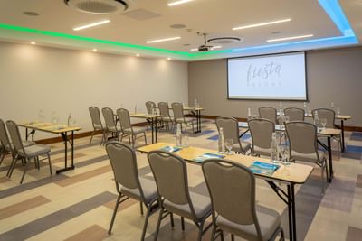 Classroom table set up in meeting room at Fiesta Resort