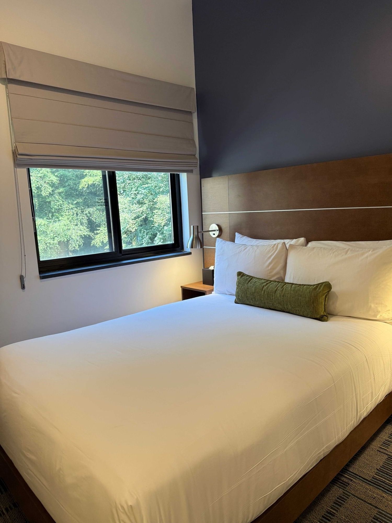 Single Room featuring a full-size bed, and a window at Bolger Center in Potomac, Maryland.