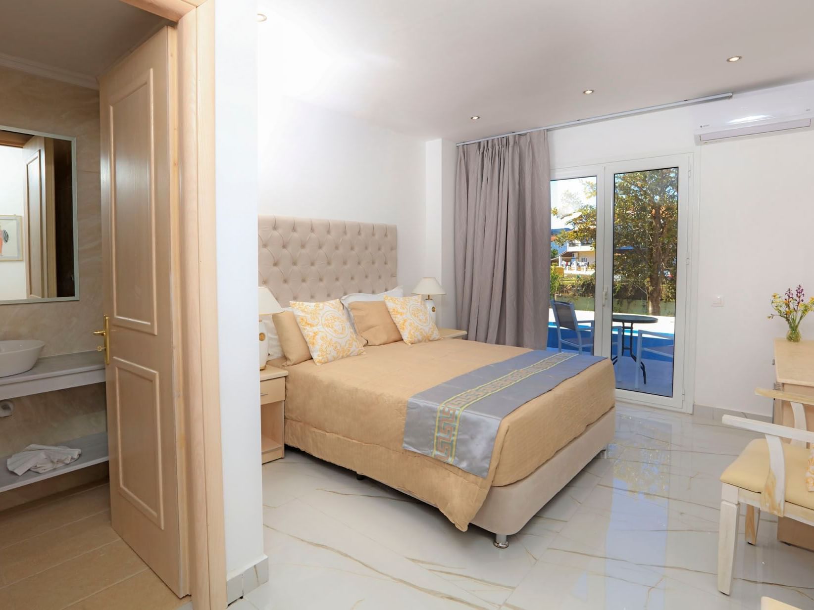 Interior of DBL Plus extra bed garden view room at CavoMarina