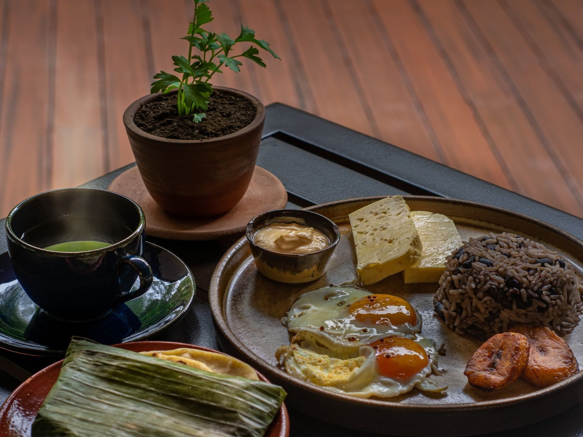 tray of assorted foods and tea