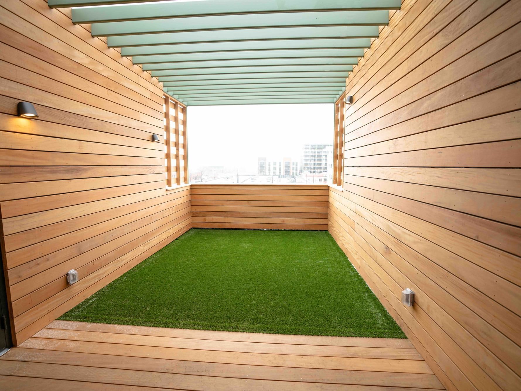 Camp Deck with a grassy pit for activities at Kinship Landing