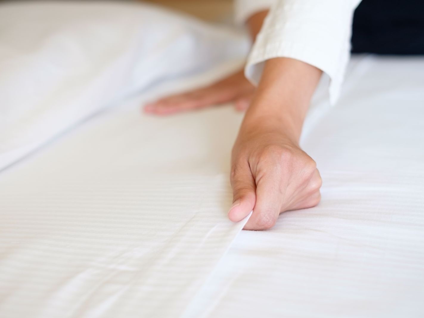 Woman making the bed