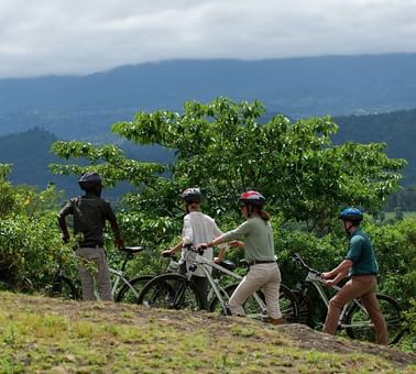 People Mountain Biking near Arusha Serena Hotels