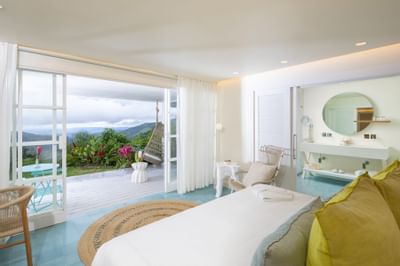 Premium suite arranged with a king bed at Retreat Costa Rica