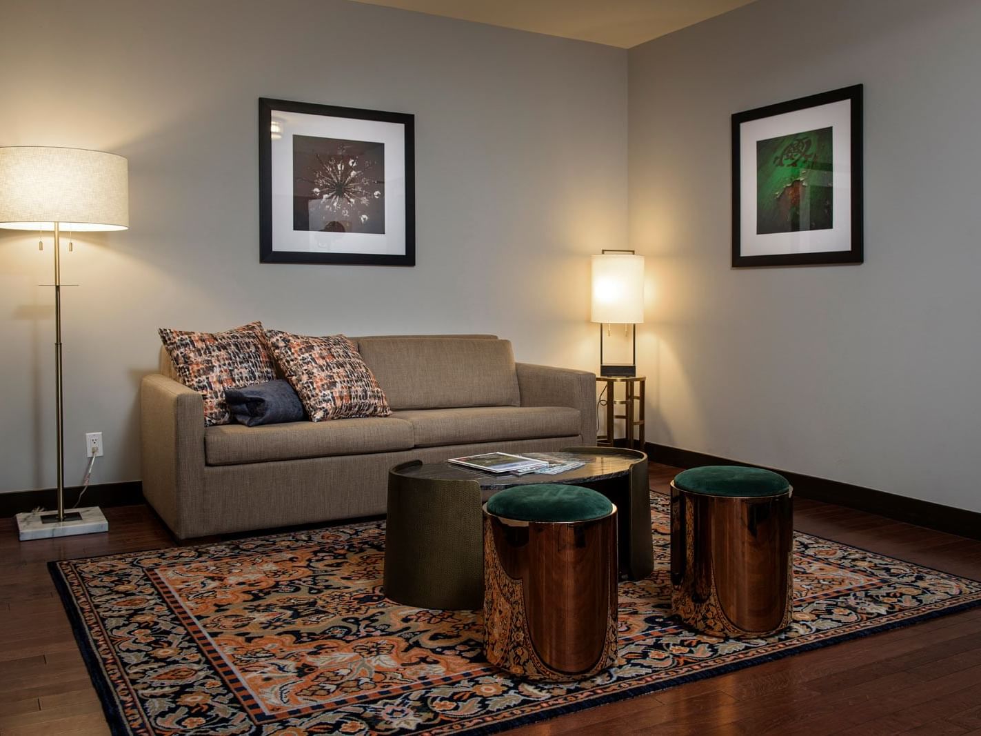 Living area in a guest room at The Mayo Hotel