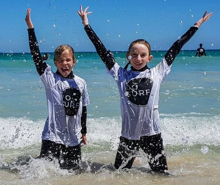 https://www.gosurfperth.com/kids-group-surf-course#school-holiday-surfing-lessons-perth-section