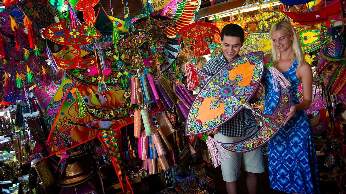 Tourists shopping for souvenirs at Central Market near Sunway Velocity Hotel