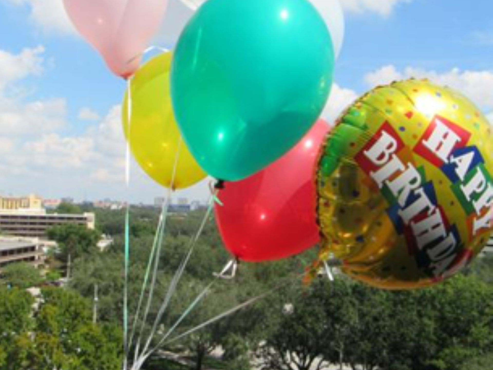 Balloons flying in the air near Rosen Inn at Pointe Orlando