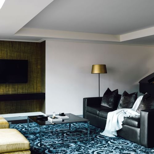 Piano & TV in Gold Penthouse lounge area at Como Melbourne
