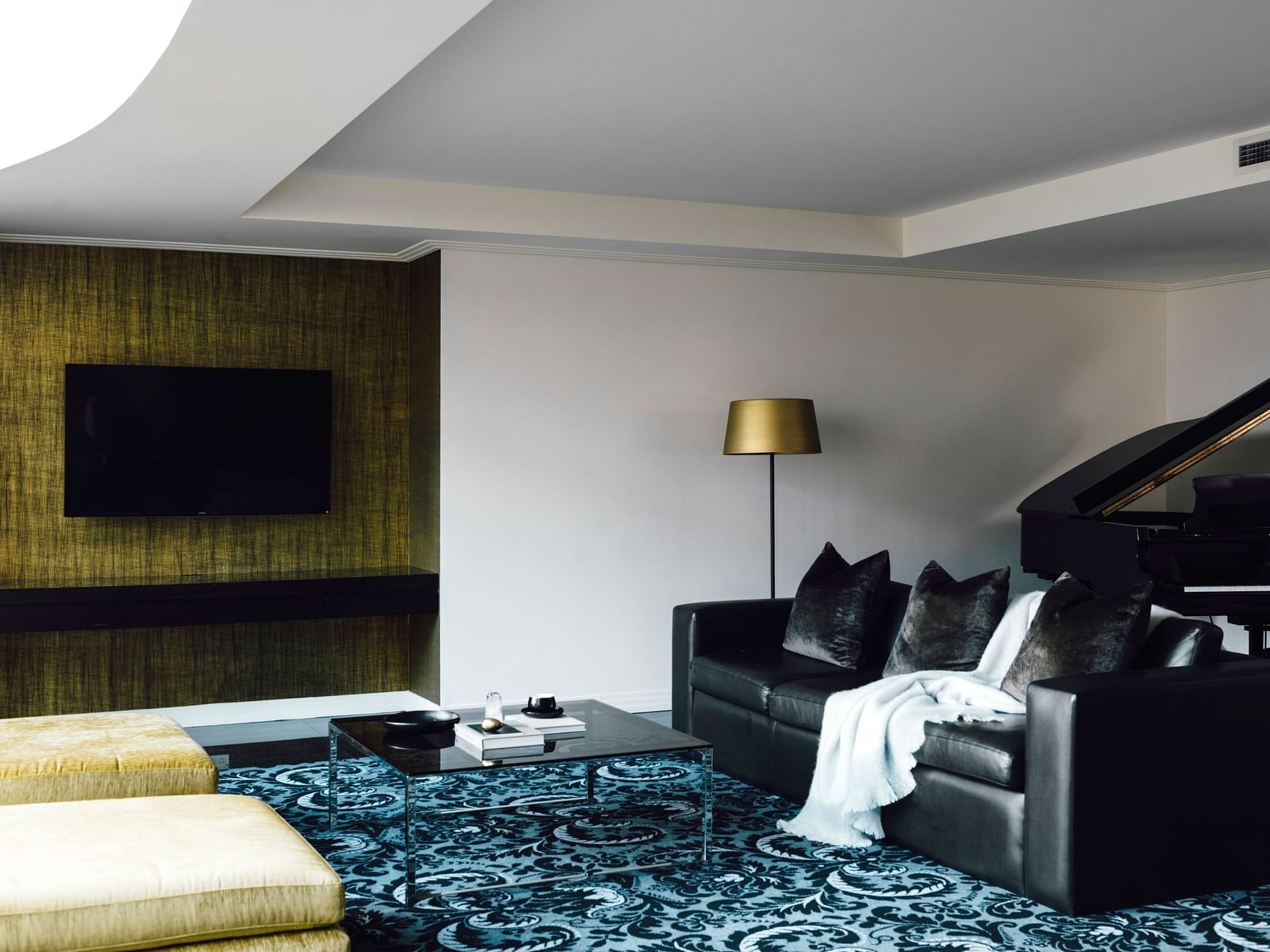 Piano & TV in Gold Penthouse lounge area at Como Melbourne