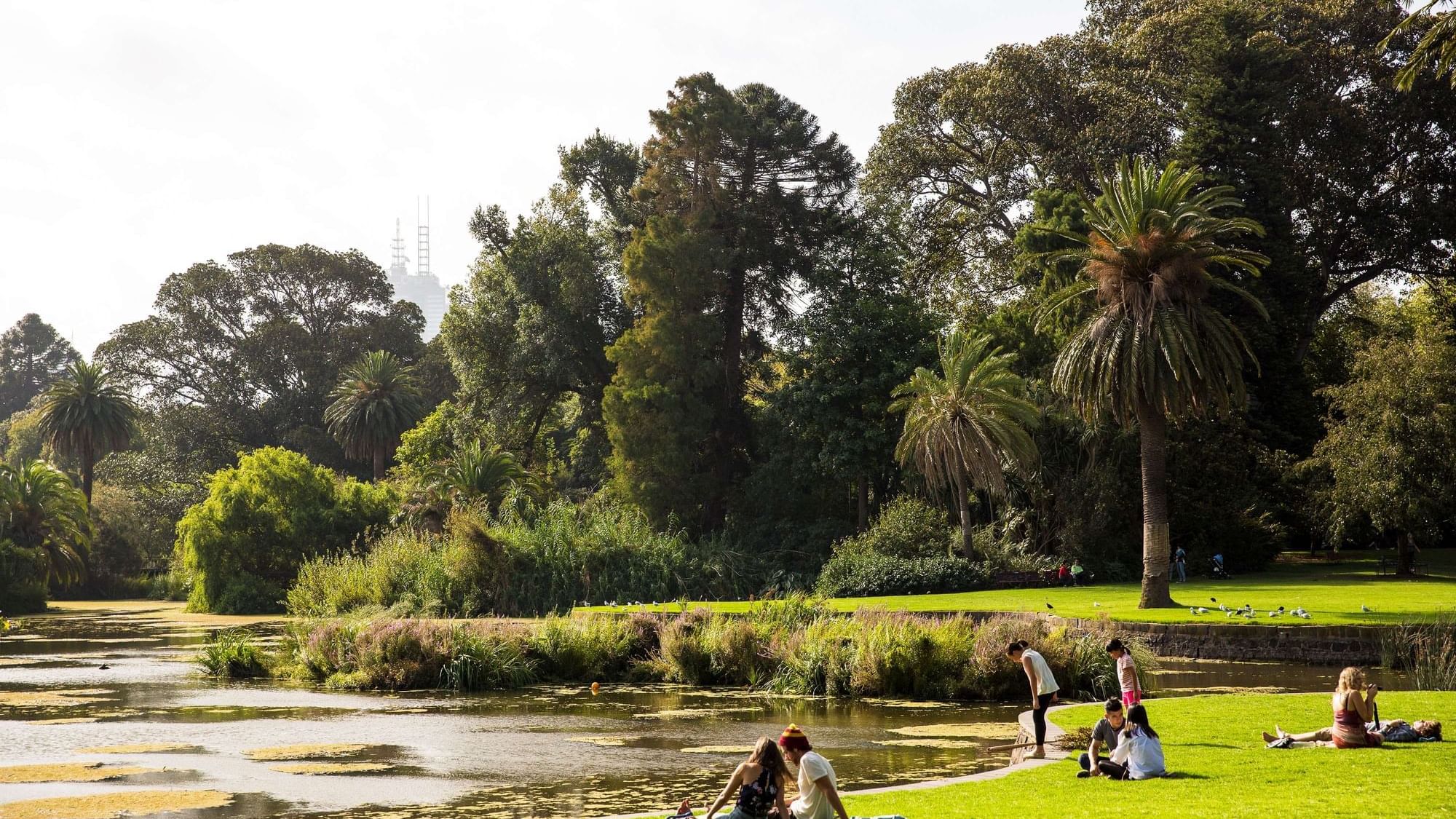 Royal Botanical Gardens People sitting by the lake on the grass on a sunny day