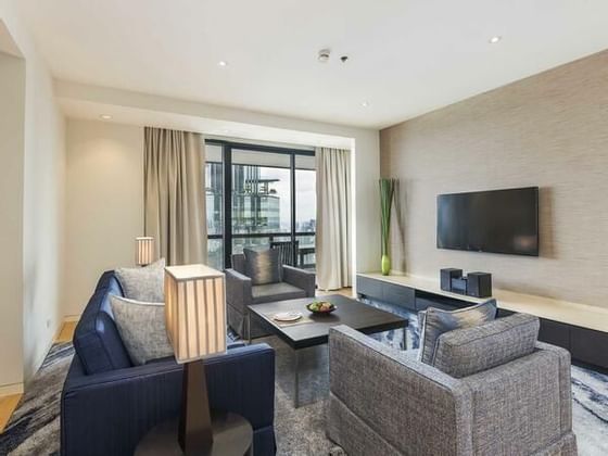 Living area in a hotel room at Emporium Suites by Chatrium