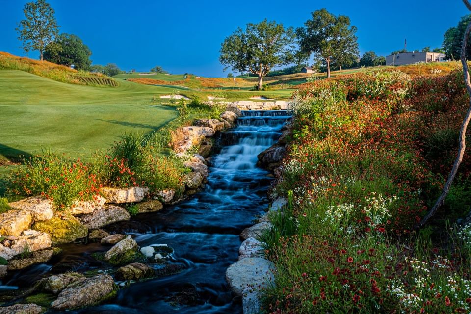 A mini water fall by the golf course near Shangri-La Monkey Island