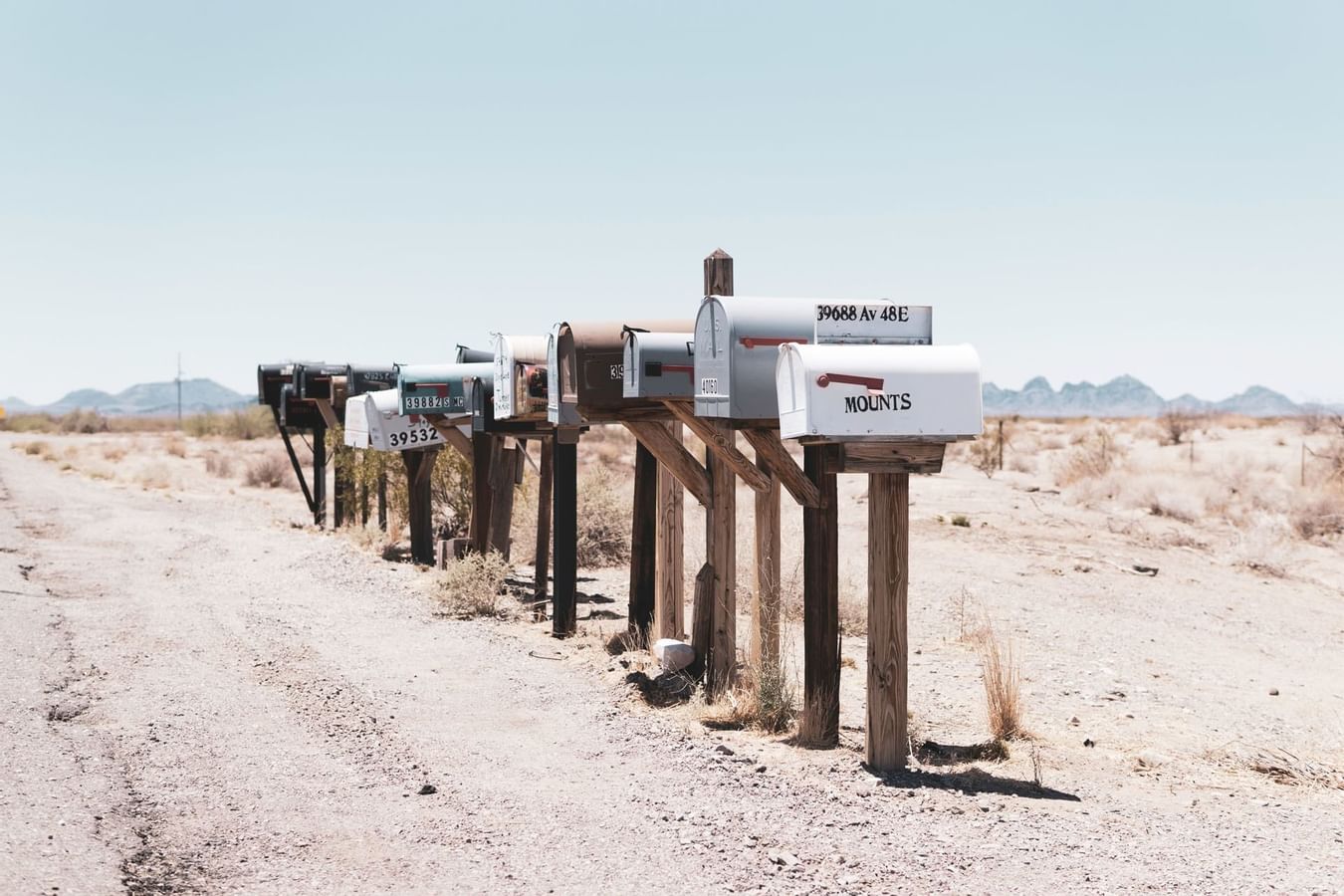 A row of mail boxes lined near The Originals Hotels