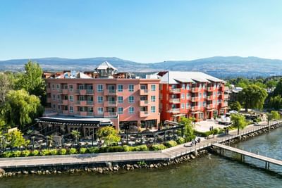 Aerial view of Manteo Resort Waterfront with river and mountain backdrop
