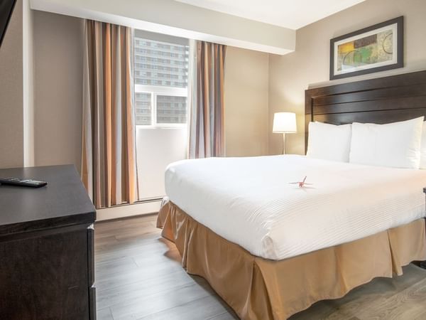 Hotel suite with queen bed