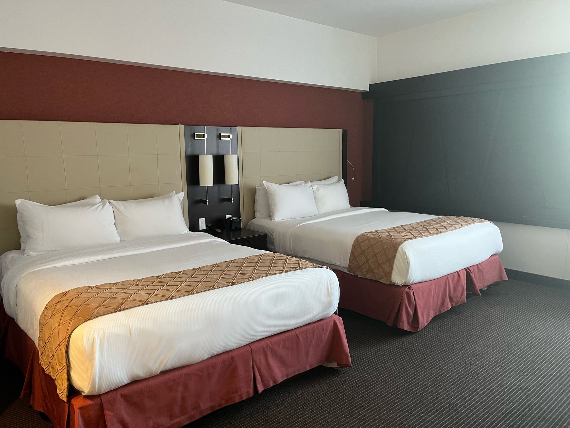 Beds in Standard Two Queen Room at Ruby Foo's Hotel