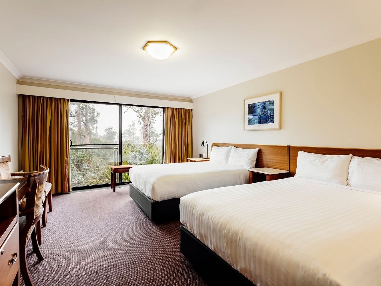 Deluxe Spa Room with two queen beds at Cradle Mountain Hotel