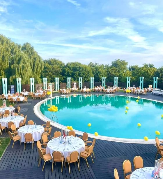 Banquet tables around the pool at Ana Hotels