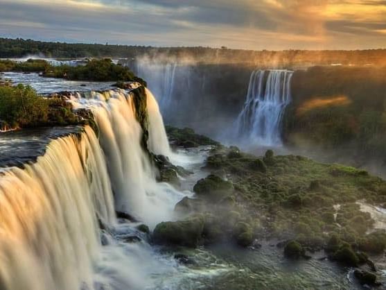 Distant view of Iguazu Falls near Grand Hotels Lux