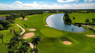 Aerial view La Estancia Golf Resort surrounded by lush greenery near The Hub Acunmeyda