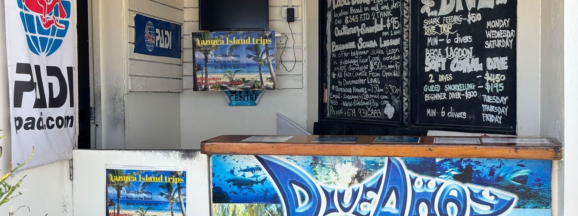 Dive centre interior with schedules and local dive information at Warwick Fiji Resort and Spa in Korolevu.