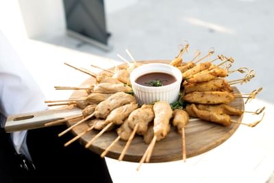 Satay dish served in restaurant at Innovation Hotel