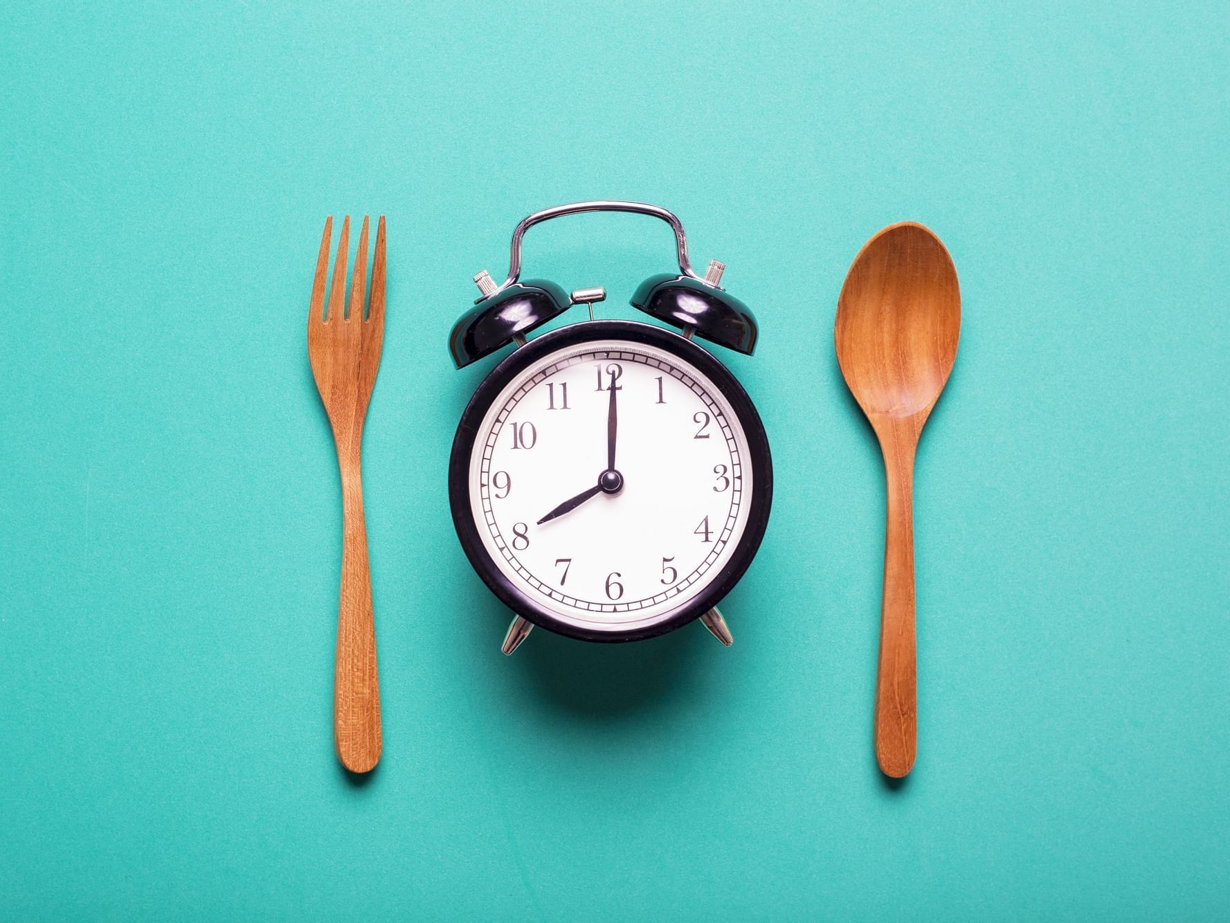 Clock with a spoon & fork at Nesuto Stadium Hotel and Apartments