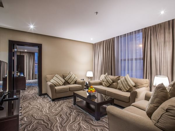 Executive suite living area with sofas at Naviti by Warwick Al Khobar