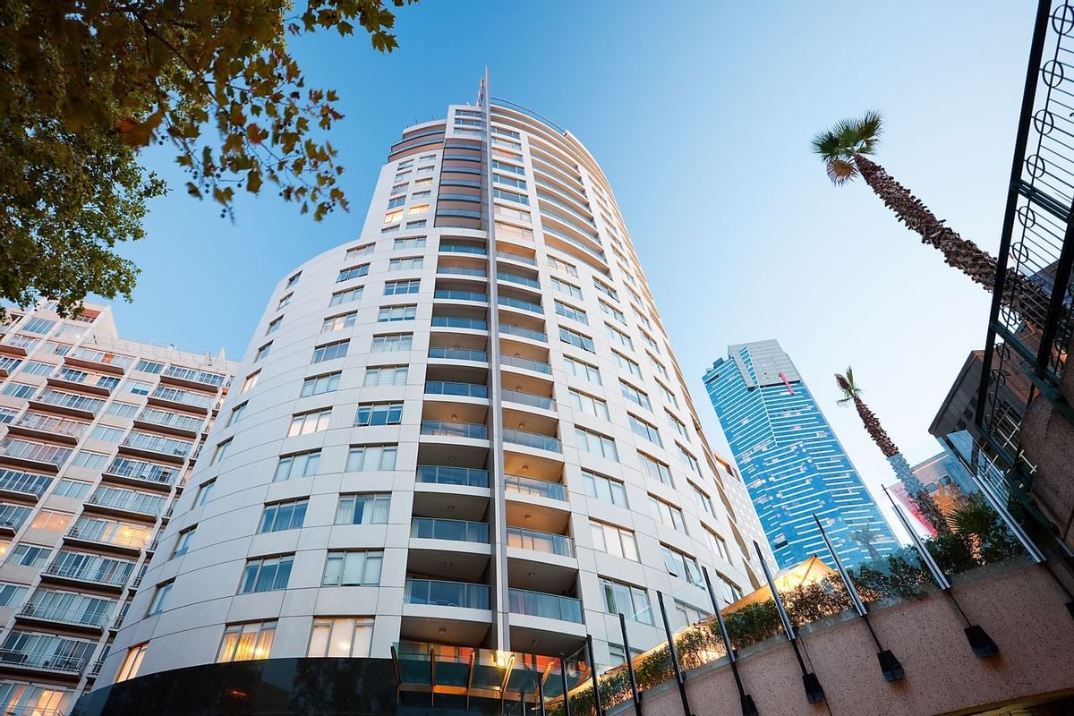 Exterior low angle view of the entrance at Quay West Suites Melbourne