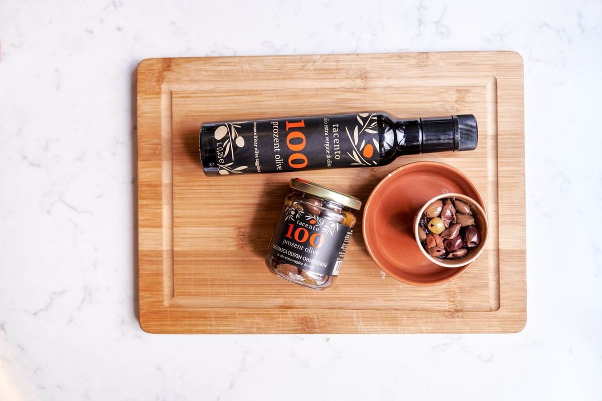 Pitted olives & a bottle of olive oil served at Flemings Hotels