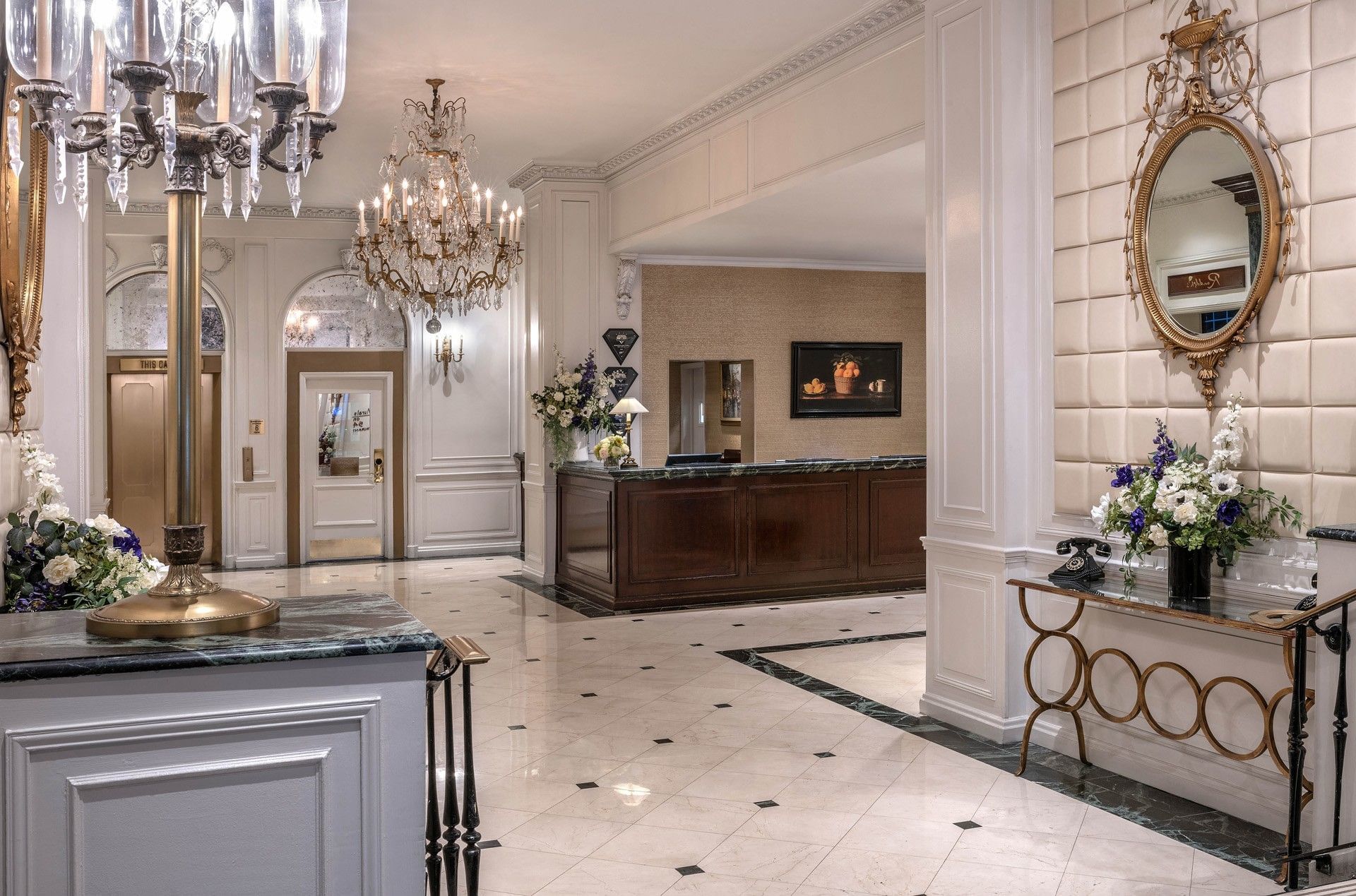Luxurious marble lobby with crystal chandeliers at the historic Warwick New York