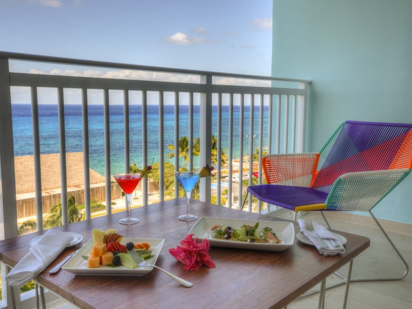 Fruits & cocktails served on Family Suite balcony at FA Hotels