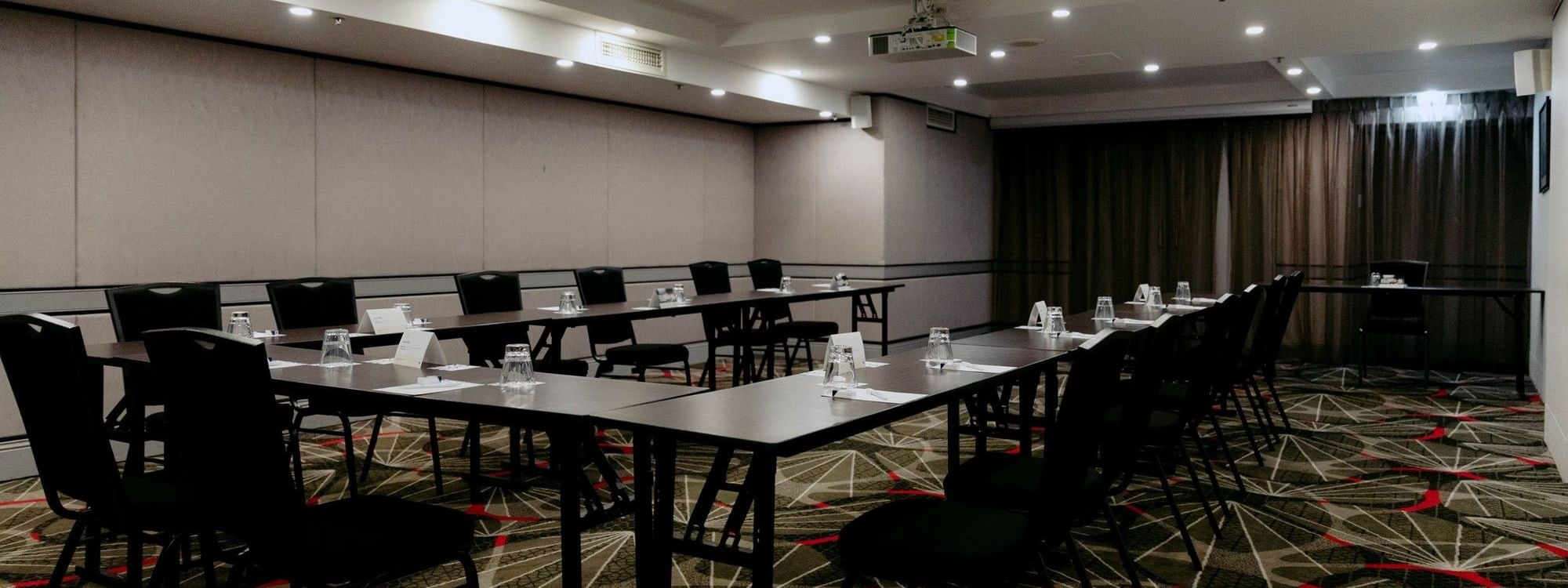 Avalon Room event setup with chairs and tables at Novotel Sydney Parramatta in Parramatta.