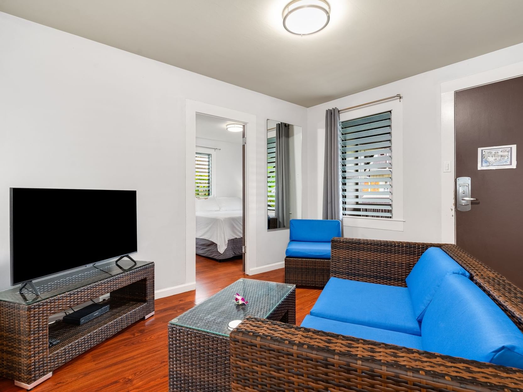 Livingroom area with comfy sofas in Two-Bedroom Suite Classic at Paradise Bay Resort