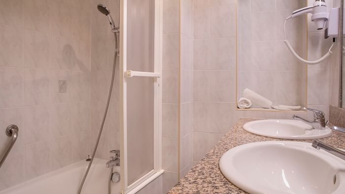 Bathroom interior in bedrooms at Hotel du Pont Roupt